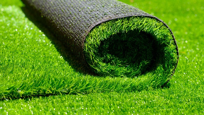 rolled up artificial grass turf lead